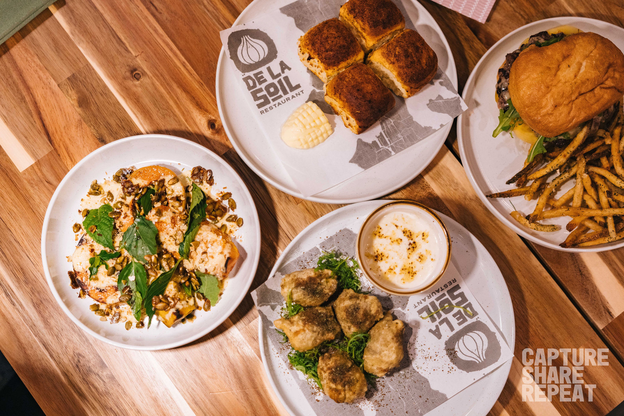 Four plates of food.